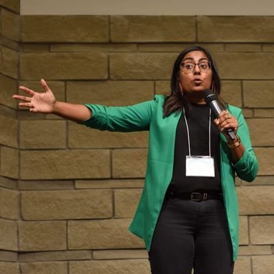 Picture of Ruth Logo, founder of The Anchor Group Ltd. giving a public speech